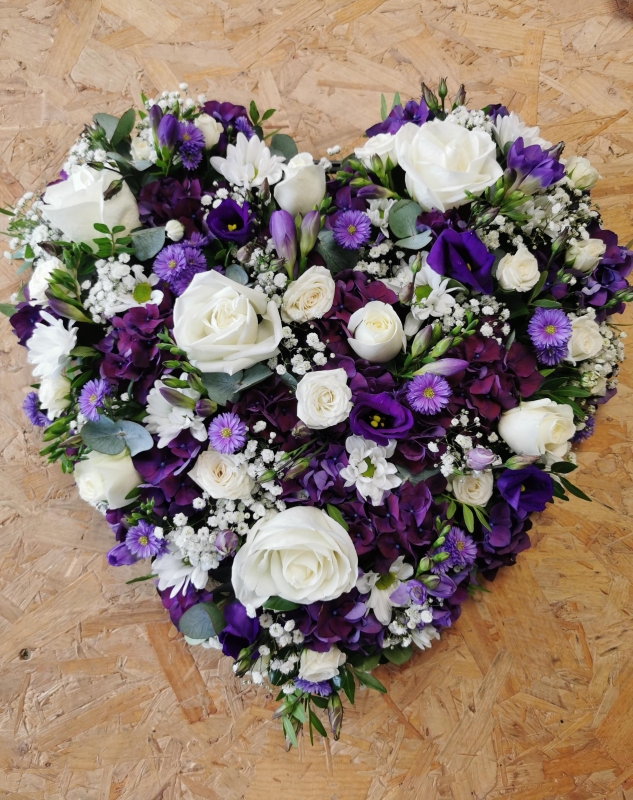 Loose heart of mixed flowers.