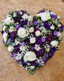 Loose heart of mixed flowers.